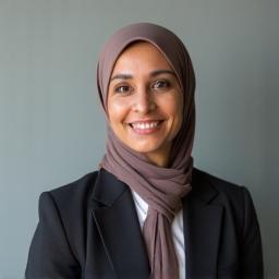 Professional headshot of Dr. Aisha Rahman