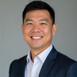 Professional headshot of Benjamin Tan